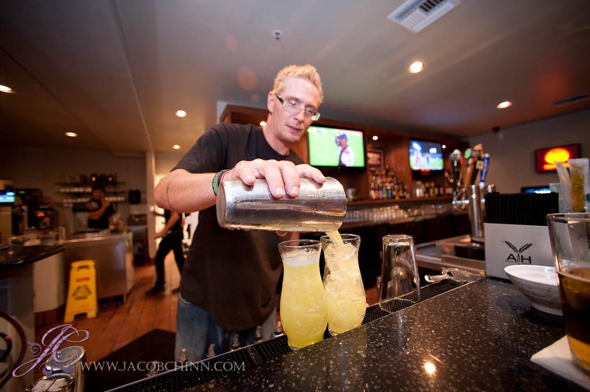 Takamatsu bartender pouring happy hour cocktails